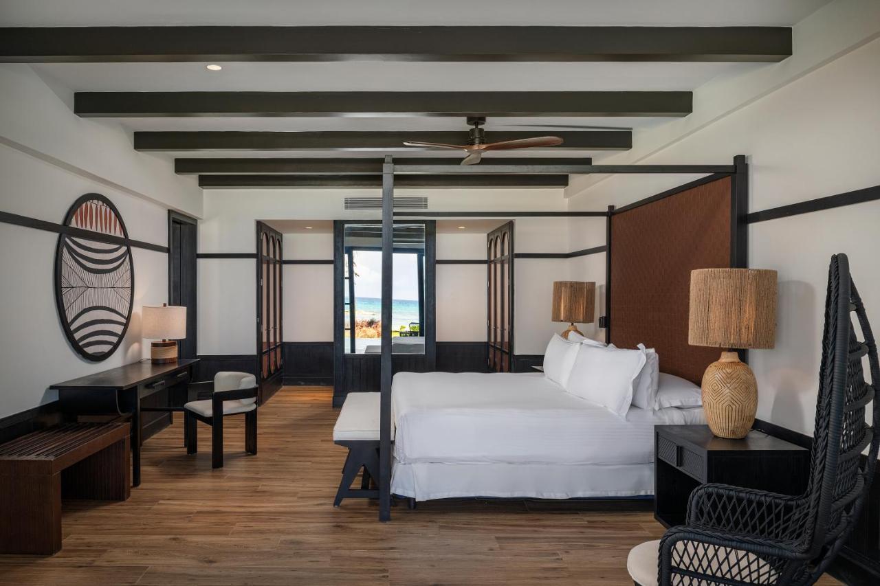 Ocean Eden Bay (Adults Only) Hotel Spring Rises Bagian luar foto A bedroom at the hotel